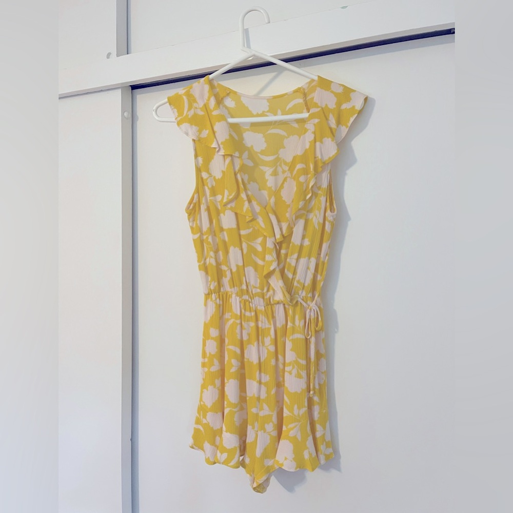 Fun, flirty yellow flowery romper
